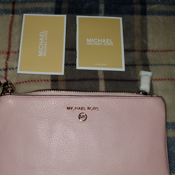 Michael Kors pink pebble leather zipper wristlet.  New without tags. - Picture 2 of 5